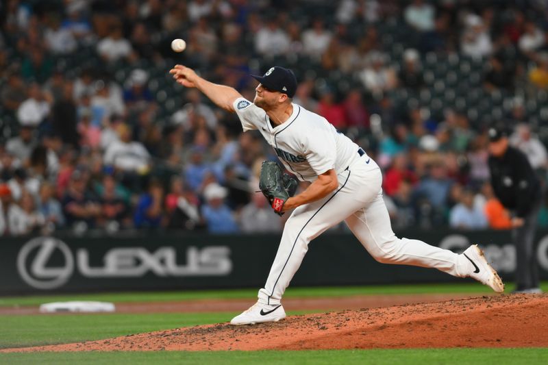 Aug 7, 2024; Seattle, Washington, USA; Seattle Mariners relief pitcher Austin Voth (30) pitches to the Detroit Tigers during the eighth inning at T-Mobile Park. Mandatory Credit: Steven Bisig-USA TODAY Sports