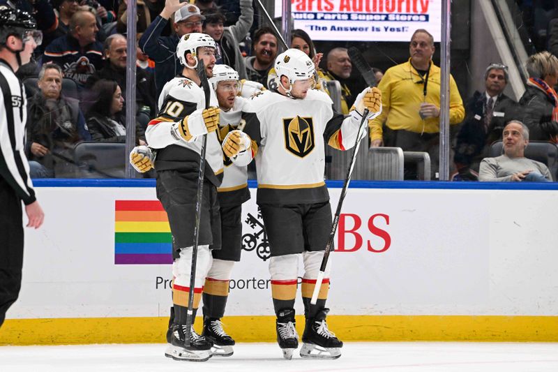 Jan 23, 2024; Elmont, New York, USA;  Vegas Golden Knights center Ivan Barbashev (49) celebrates his goal against the New York Islanders during the first period at UBS Arena. Mandatory Credit: Dennis Schneidler-USA TODAY Sports