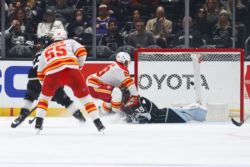 Dec 23, 2023; Los Angeles, California, USA; Calgary Flames center Blake Coleman (20) scores a goal during the second period against the Los Angeles Kings at Crypto.com Arena. Mandatory Credit: Jessica Alcheh-USA TODAY Sports