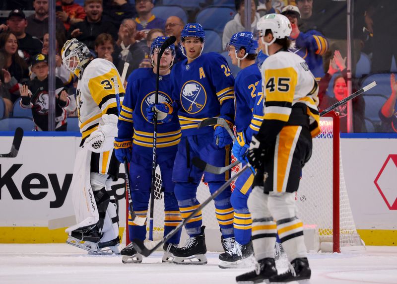 Sep 21, 2024; Buffalo, New York, USA;  Buffalo Sabres center Dylan Cozens (24) celebrates his goal with teammates during the third period against the Pittsburgh Penguins at KeyBank Center. Mandatory Credit: Timothy T. Ludwig-Imagn Images