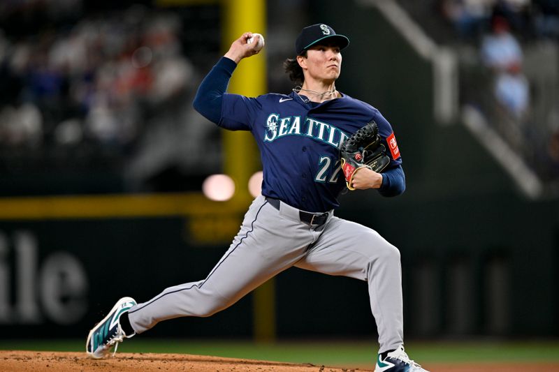 May 2, 2025; Arlington, Texas, USA; Seattle Mariners starting pitcher Bryan Woo (22) pitches against the Texas Rangers during the first inning at Globe Life Field. Mandatory Credit: Jerome Miron-Imagn Images