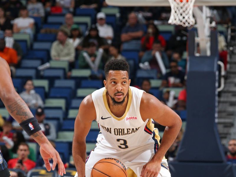 NEW ORLEANS, LA - OCTOBER 10: CJ McCollum #3 of the New Orleans Pelicans handles the ball during the game against the Orlando Magic on October 10, 2023 at the Smoothie King Center in New Orleans, Louisiana. NOTE TO USER: User expressly acknowledges and agrees that, by downloading and or using this Photograph, user is consenting to the terms and conditions of the Getty Images License Agreement. Mandatory Copyright Notice: Copyright 2023 NBAE (Photo by Layne Murdoch Jr./NBAE via Getty Images)