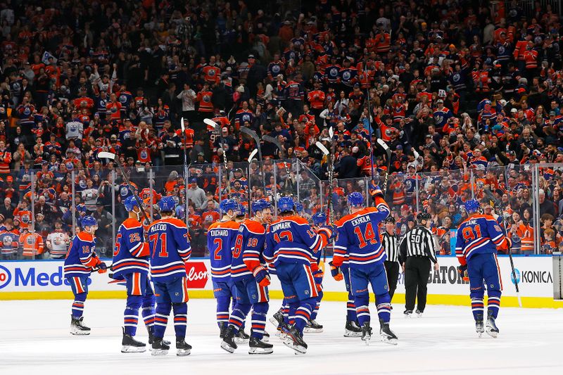 Jan 27, 2024; Edmonton, Alberta, CAN; The Edmonton Oilers celebrate their 16th straight win with a 4-1 victory over the Nashville Predators at Rogers Place. Mandatory Credit: Perry Nelson-USA TODAY Sports