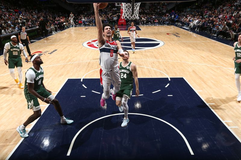 WASHINGTON, DC -? APRIL 2:  Deni Avdija #8 of the Washington Wizards goes to the basket during the game on April 2, 2024 at Capital One Arena in Washington, DC. NOTE TO USER: User expressly acknowledges and agrees that, by downloading and or using this Photograph, user is consenting to the terms and conditions of the Getty Images License Agreement. Mandatory Copyright Notice: Copyright 2024 NBAE (Photo by Kenny Giarla/NBAE via Getty Images)