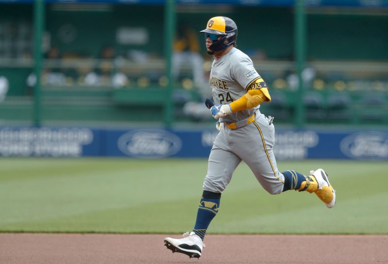 Apr 25, 2024; Pittsburgh, Pennsylvania, USA;  Milwaukee Brewers catcher William Contreras (24) circles the bases on a solo home run against the Pittsburgh Pirates during the first inning at PNC Park. Mandatory Credit: Charles LeClaire-USA TODAY Sports