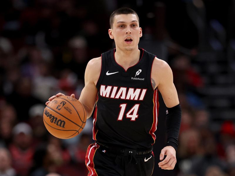 CHICAGO, ILLINOIS - FEBRUARY 04: Tyler Herro #14 of the Miami Heat in action against the Chicago Bulls at the United Center on February 04, 2025 in Chicago, Illinois. NOTE TO USER: User expressly acknowledges and agrees that, by downloading and or using this photograph, user is consenting to the terms and conditions of the Getty Images License Agreement.  (Photo by Luke Hales/Getty Images)