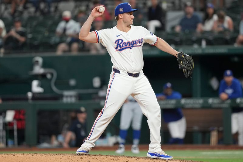 Jun 17, 2024; Arlington, Texas, USA; Texas Rangers positional player Andrew Knizner (12) delivers a pitch to the New York Mets during the ninth inning at Globe Life Field. Mandatory Credit: Jim Cowsert-USA TODAY Sports