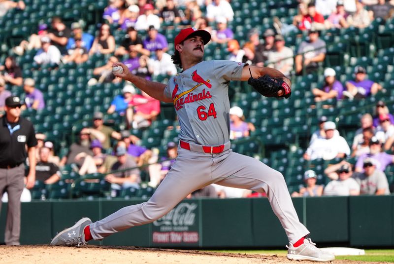 Sep 26, 2024; Denver, Colorado, USA; St. Louis Cardinals pitcher Ryan Fernandez (64) delivers a pitch in the eighth inning against the Colorado Rockies at Coors Field. Mandatory Credit: Ron Chenoy-Imagn Images