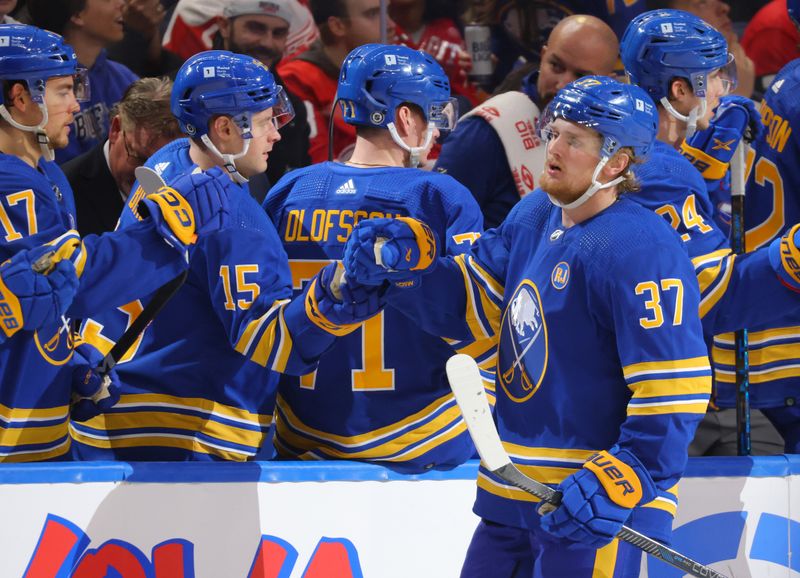 Dec 5, 2023; Buffalo, New York, USA;  Buffalo Sabres center Casey Mittelstadt (37) celebrates his goal with teammates during the third period against the Detroit Red Wings at KeyBank Center. Mandatory Credit: Timothy T. Ludwig-USA TODAY Sports