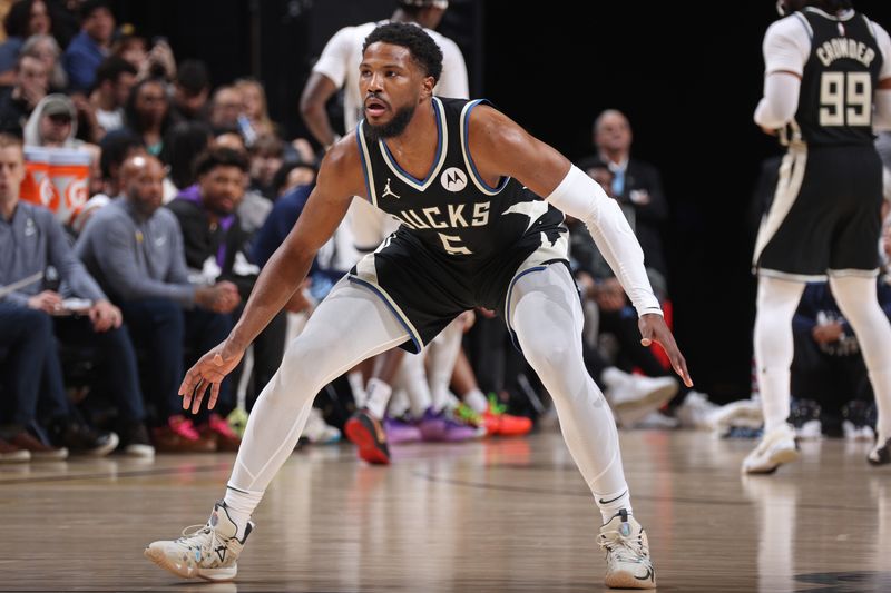 MEMPHIS, TN - FEBRUARY 15: Malik Beasley #5 of the Milwaukee Bucks plays defense during the game against the Memphis Grizzlies on February 15, 2024 at FedExForum in Memphis, Tennessee. NOTE TO USER: User expressly acknowledges and agrees that, by downloading and or using this photograph, User is consenting to the terms and conditions of the Getty Images License Agreement. Mandatory Copyright Notice: Copyright 2024 NBAE (Photo by Stephen Gosling/NBAE via Getty Images)