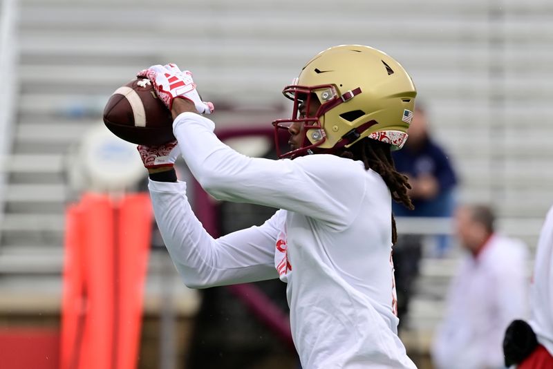 Sep 16, 2023; Chestnut Hill, Massachusetts, USA; Boston College Eagles wide receiver Dino Tomlin (13) warms up before a game against the Florida State Seminoles at Alumni Stadium. Mandatory Credit: Eric Canha-USA TODAY Sports