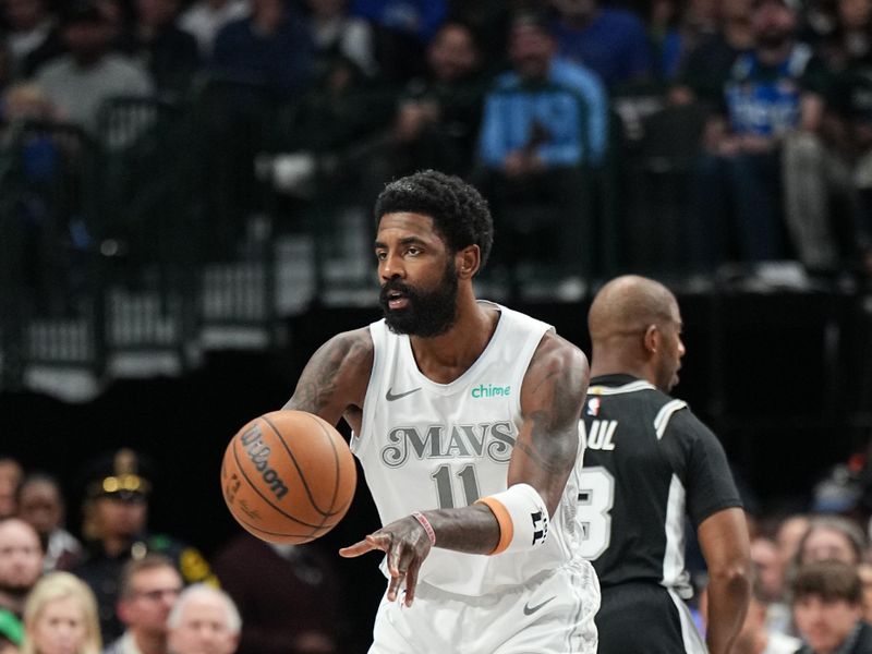 DALLAS, TX - NOVEMBER 16: Kyrie Irving #11 of the Dallas Mavericks passes the ball during the game against the San Antonio Spurs on November 16, 2024 at American Airlines Center in Dallas, Texas. NOTE TO USER: User expressly acknowledges and agrees that, by downloading and or using this photograph, User is consenting to the terms and conditions of the Getty Images License Agreement. Mandatory Copyright Notice: Copyright 2024 NBAE (Photo by Glenn James/NBAE via Getty Images)