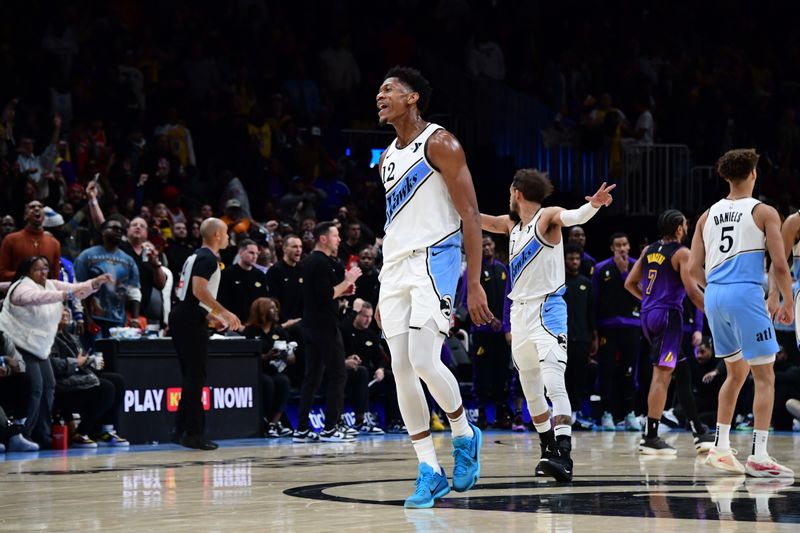 ATLANTA, GA - DECEMBER 6: De'Andre Hunter #12 of the Atlanta Hawks celebrates during the game against the Los Angeles Lakers on December 6, 2024 at State Farm Arena in Atlanta, Georgia.  NOTE TO USER: User expressly acknowledges and agrees that, by downloading and/or using this Photograph, user is consenting to the terms and conditions of the Getty Images License Agreement. Mandatory Copyright Notice: Copyright 2024 NBAE (Photo by Scott Cunningham/NBAE via Getty Images)