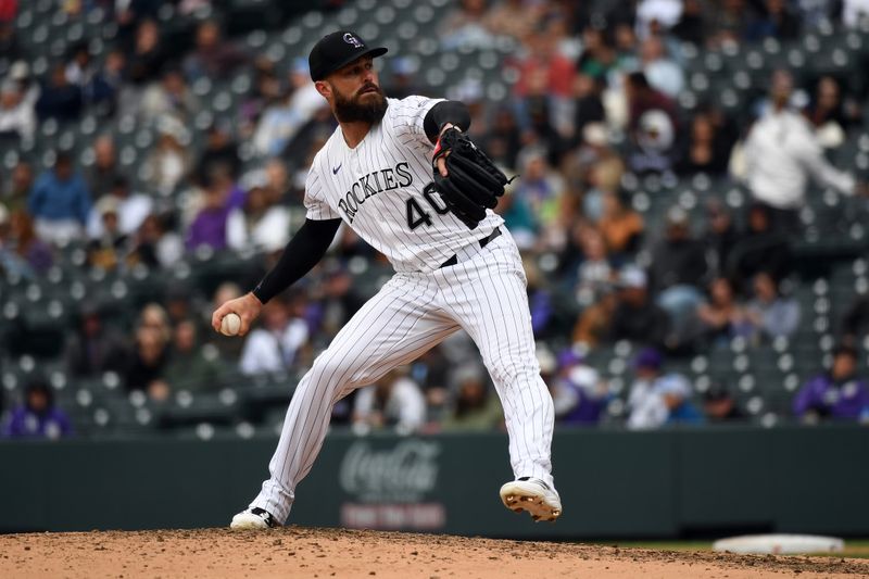 Apr 19, 2025; Denver, Colorado, USA; Colorado Rockies pitcher Tyler Kinley (40) throws during the ninth inning against the Washington Nationals at Coors Field. Mandatory Credit: Christopher Hanewinckel-Imagn Images