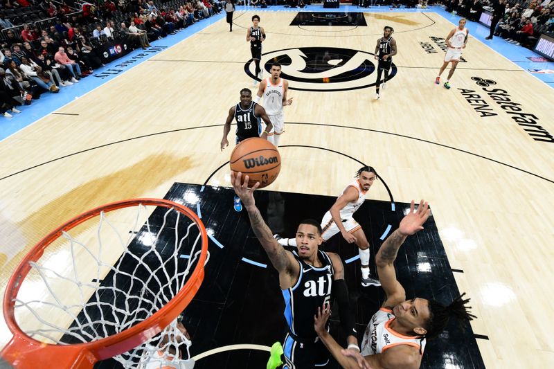 ATLANTA, GA - JANUARY 15: Dejounte Murray #5 of the Atlanta Hawks drives to the basket during the game against the San Antonio Spurs on January 15, 2024 at State Farm Arena in Atlanta, Georgia.  NOTE TO USER: User expressly acknowledges and agrees that, by downloading and/or using this Photograph, user is consenting to the terms and conditions of the Getty Images License Agreement. Mandatory Copyright Notice: Copyright 2024 NBAE (Photo by Adam Hagy/NBAE via Getty Images)