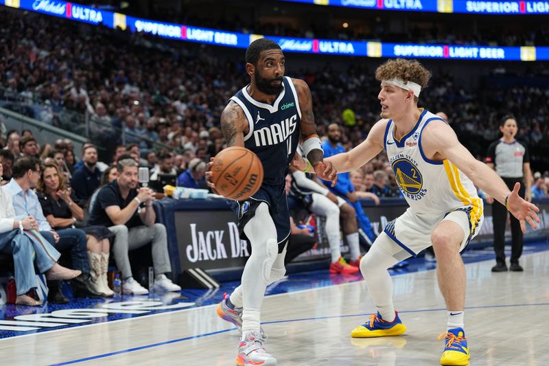 DALLAS, TX - APRIL 5:  Kyrie Irving #11 of the Dallas Mavericks passes the ball during the game against the Golden State Warriors on April 5, 2024 at the American Airlines Center in Dallas, Texas. NOTE TO USER: User expressly acknowledges and agrees that, by downloading and or using this photograph, User is consenting to the terms and conditions of the Getty Images License Agreement. Mandatory Copyright Notice: Copyright 2024 NBAE (Photo by Glenn James/NBAE via Getty Images)