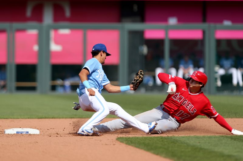 Jun 17, 2023; Kansas City, Missouri, USA; Kansas City Royals second baseman Nicky Lopez (8) tags Los Angeles Angels designated hitter Shohei Ohtani (17) as he slides into second base during the fourth inning at Kauffman Stadium. Mandatory Credit: Scott Sewell-USA TODAY Sports