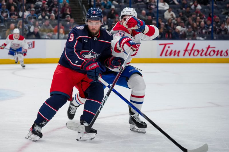 Nov 29, 2023; Columbus, Ohio, USA;  Columbus Blue Jackets defenseman Ivan Provorov (9) skates for the puck against Montreal Canadiens left wing Juraj Slafkovsky (20) in the third period at Nationwide Arena. Mandatory Credit: Aaron Doster-USA TODAY Sports