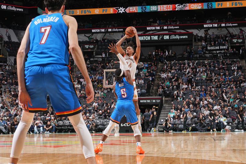 SAN ANTONIO, TX - JANUARY 24: Devin Vassell #24 of the San Antonio Spurs shoots the ball during the game against the Oklahoma City Thunder on January 24, 2023 at the Frost Bank Center in San Antonio, Texas. NOTE TO USER: User expressly acknowledges and agrees that, by downloading and or using this photograph, user is consenting to the terms and conditions of the Getty Images License Agreement. Mandatory Copyright Notice: Copyright 2024 NBAE (Photos by Jesse D. Garrabrant/NBAE via Getty Images)