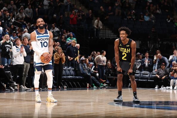 MINNEAPOLIS, MN - NOVEMBER 30: Mike Conley #10 of the Minnesota Timberwolves and Colin Sexton #2 of the Utah Jazz smile after the game on November 30, 2023 at Target Center in Minneapolis, Minnesota. NOTE TO USER: User expressly acknowledges and agrees that, by downloading and or using this Photograph, user is consenting to the terms and conditions of the Getty Images License Agreement. Mandatory Copyright Notice: Copyright 2023 NBAE (Photo by David Sherman/NBAE via Getty Images)