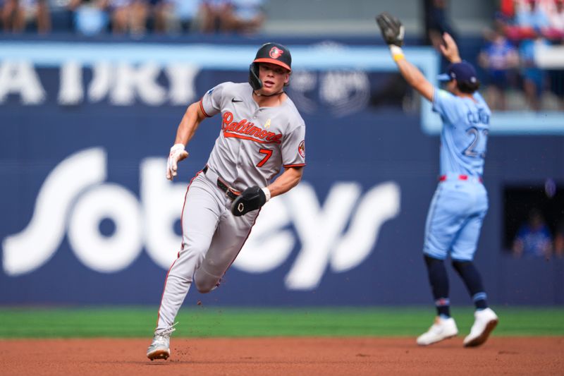 Sep 14, 2025; Toronto, Ontario, CAN; Baltimore Orioles second base Jackson Holliday (7) turns second base against the Toronto Blue Jays during the first inning at Rogers Centre. Mandatory Credit: Kevin Sousa-Imagn Images