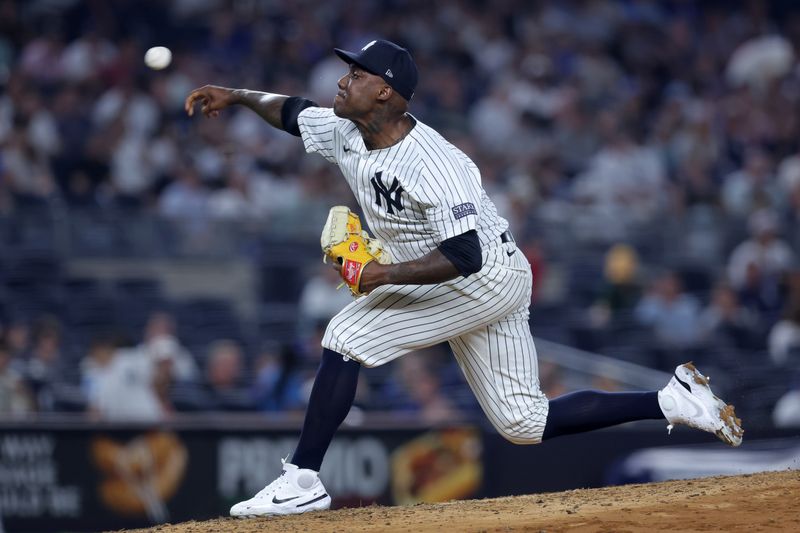 Aug 2, 2024; Bronx, New York, USA; New York Yankees relief pitcher Enyel de los Santos (62) pitches against the Toronto Blue Jays during the seventh inning at Yankee Stadium. Mandatory Credit: Brad Penner-USA TODAY Sports