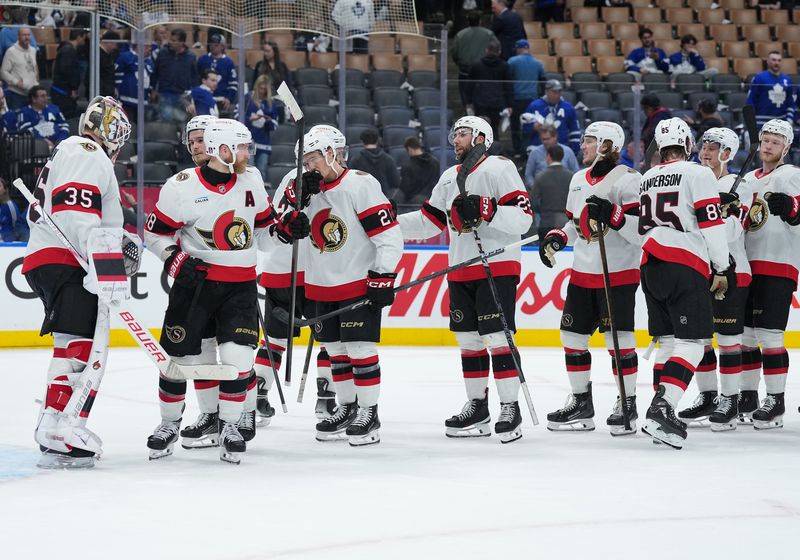 Apr 29, 2025; Toronto, Ontario, CAN; The Ottawa Senators players celebrate after defeating the Toronto Maple Leafs during game five of the first round of the 2025 Stanley Cup Playoffs at Scotiabank Arena. Mandatory Credit: Nick Turchiaro-Imagn Images