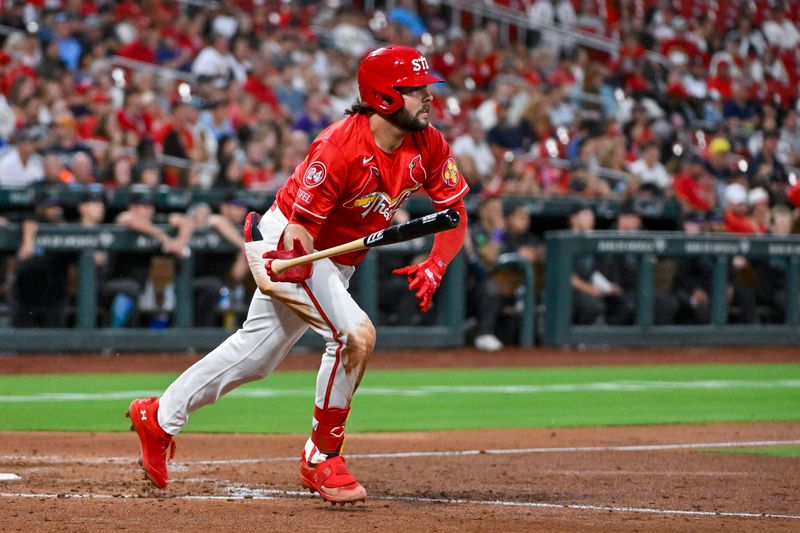 Aug 7, 2024; St. Louis, Missouri, USA;  St. Louis Cardinals first baseman Alec Burleson (41) hits a two run double against the Tampa Bay Rays during the fourth inning at Busch Stadium. Mandatory Credit: Jeff Curry-USA TODAY Sports