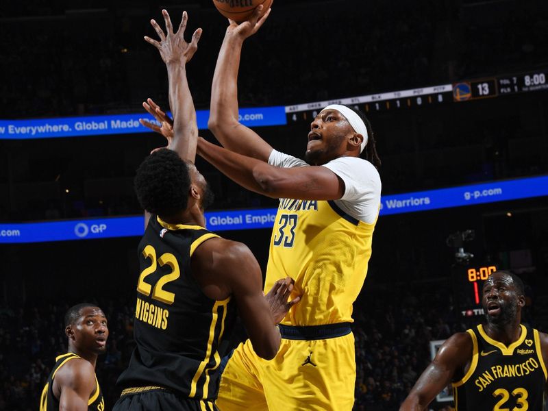 SAN FRANCISCO, CA - MARCH 22: Myles Turner #33 of the Indiana Pacers drives to the basket during the game against the Golden State Warriors on March 22, 2024 at Chase Center in San Francisco, California. NOTE TO USER: User expressly acknowledges and agrees that, by downloading and or using this photograph, user is consenting to the terms and conditions of Getty Images License Agreement. Mandatory Copyright Notice: Copyright 2024 NBAE (Photo by Noah Graham/NBAE via Getty Images)