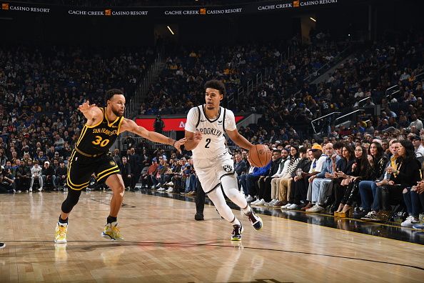 SAN FRANCISCO, CA - DECEMBER 16: Cameron Johnson #2 of the Brooklyn Nets drives to the basket during the game against the Golden State Warriors on December 16, 2023 at Chase Center in San Francisco, California. NOTE TO USER: User expressly acknowledges and agrees that, by downloading and or using this photograph, user is consenting to the terms and conditions of Getty Images License Agreement. Mandatory Copyright Notice: Copyright 2023 NBAE (Photo by Noah Graham/NBAE via Getty Images)