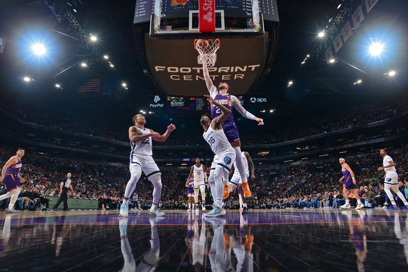 PHOENIX, AZ - JANUARY  7: Jusuf Nurkic #20 of the Phoenix Suns shoots the ball during the game against the Memphis Grizzlies on January 7, 2024 at Footprint Center in Phoenix, Arizona. NOTE TO USER: User expressly acknowledges and agrees that, by downloading and or using this photograph, user is consenting to the terms and conditions of the Getty Images License Agreement. Mandatory Copyright Notice: Copyright 2024 NBAE (Photo by Kate Frese/NBAE via Getty Images)