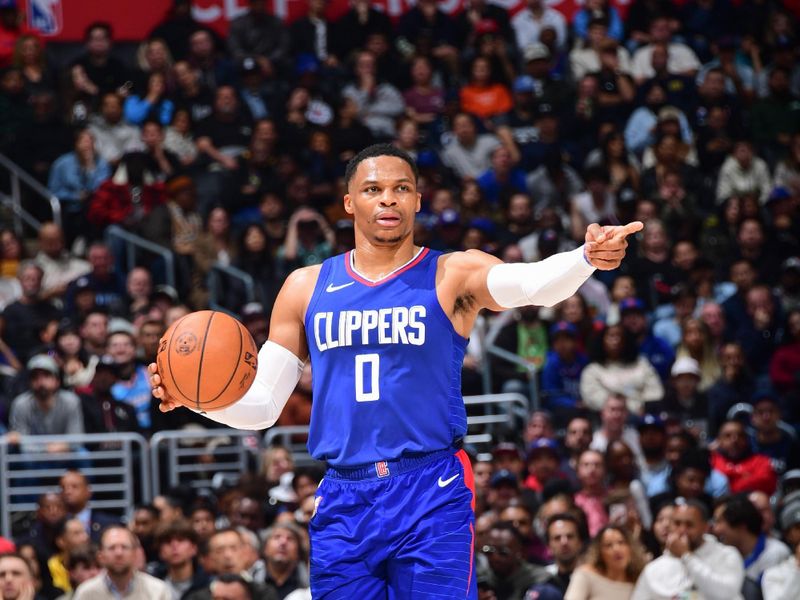 LOS ANGELES, CA - FEBRUARY 12:  Russell Westbrook #0 of the LA Clippers handles the ball during the game  on February 12, 2024 at Crypto.Com Arena in Los Angeles, California. NOTE TO USER: User expressly acknowledges and agrees that, by downloading and/or using this Photograph, user is consenting to the terms and conditions of the Getty Images License Agreement. Mandatory Copyright Notice: Copyright 2024 NBAE (Photo by Adam Pantozzi/NBAE via Getty Images)