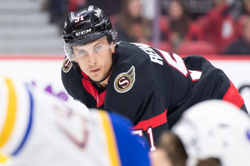 Sep 26, 2024; Ottawa, Ontario, CAN; Ottawa Senators left wing Cole Reinhardt (51) gets in position for a faceoff in the first period against the Buffalo Sabres at the Canadian Tire Centre. Mandatory Credit: Marc DesRosiers-Imagn Images