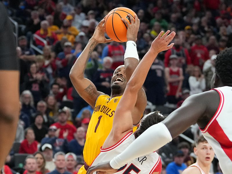 Mar 10, 2023; Las Vegas, NV, USA; Arizona State Sun Devils guard Luther Muhammad (1) shoots against Arizona Wildcats guard Kerr Kriisa (25) during the first half at T-Mobile Arena. Mandatory Credit: Stephen R. Sylvanie-USA TODAY Sports