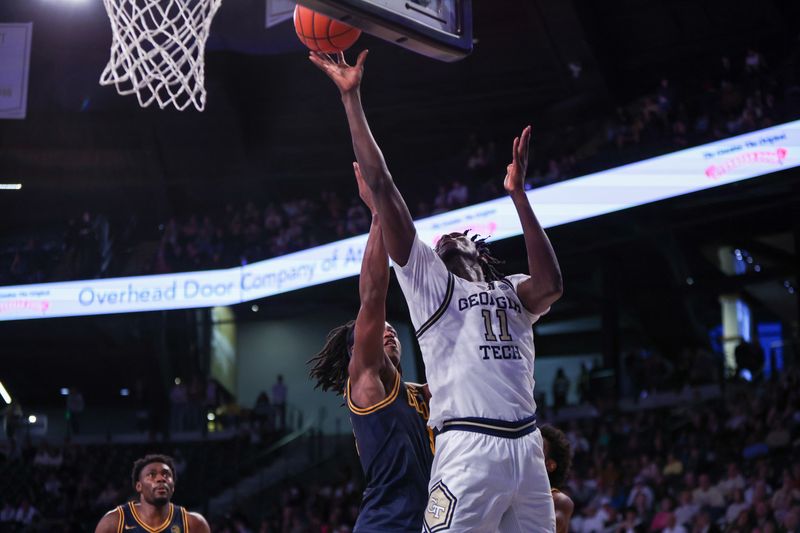 Feb 15, 2025; Atlanta, Georgia, USA; Georgia Tech Yellow Jackets forward Baye Ndongo (11) shoots against the California Golden Bears in the second half at McCamish Pavilion. Mandatory Credit: Brett Davis-Imagn Images