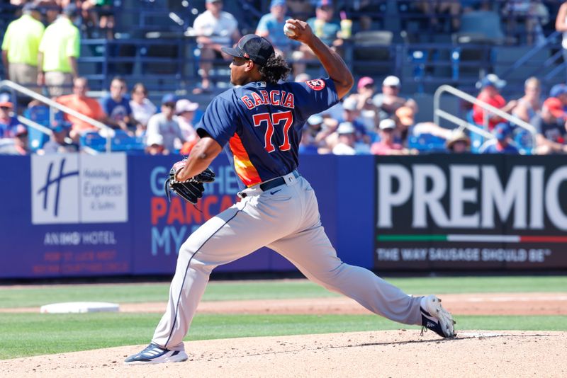 Feb 28, 2023; Port St. Lucie, Florida, USA; Houston Astros starting pitcher Luis Garcia (77) throws a pitch during the first inning against the New York Mets at Clover Park. Mandatory Credit: Reinhold Matay-USA TODAY Sports