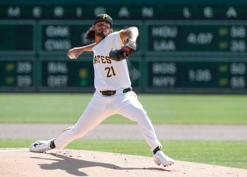 Sep 15, 2024; Pittsburgh, Pennsylvania, USA;  Pittsburgh Pirates starting pitcher Jared Jones (37) delivers a pitch against the Kansas City Royals during the first inning at PNC Park. Mandatory Credit: Charles LeClaire-Imagn Images