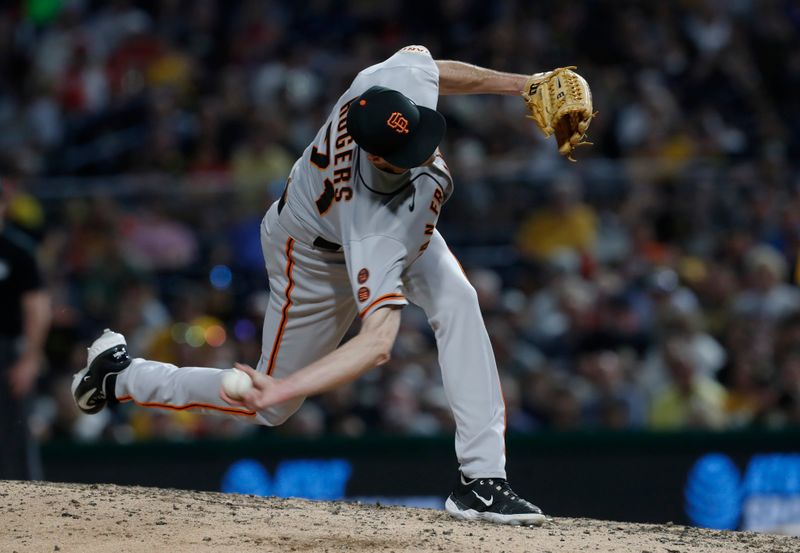 Jul 14, 2023; Pittsburgh, Pennsylvania, USA;  San Francisco Giants relief pitcher Tyler Rogers (71) pitches against the Pittsburgh Pirates during the eighth inning at PNC Park. The Giants won 6-4. Mandatory Credit: Charles LeClaire-USA TODAY Sports