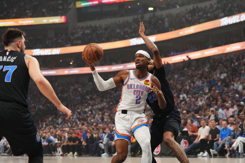 DALLAS, TX - MAY 18: Shai Gilgeous-Alexander #2 of the Oklahoma City Thunder handles the ball during the game against the Dallas Mavericks during Round 2 Game 6 of the 2024 NBA Playoffs on May 18, 2024 at the American Airlines Center in Dallas, Texas. NOTE TO USER: User expressly acknowledges and agrees that, by downloading and or using this photograph, User is consenting to the terms and conditions of the Getty Images License Agreement. Mandatory Copyright Notice: Copyright 2024 NBAE (Photo by Cooper Neill/NBAE via Getty Images)