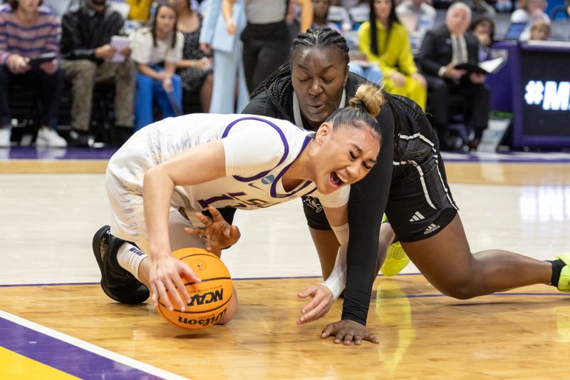 Mar 22, 2024; Baton Rouge, Louisiana, USA; LSU Lady Tigers guard Last-Tear Poa (13) goes for loose ball against Rice Owls center Sussy Ngulefac (35) during the first half at Pete Maravich Assembly Center. Mandatory Credit: Stephen Lew-USA TODAY Sports