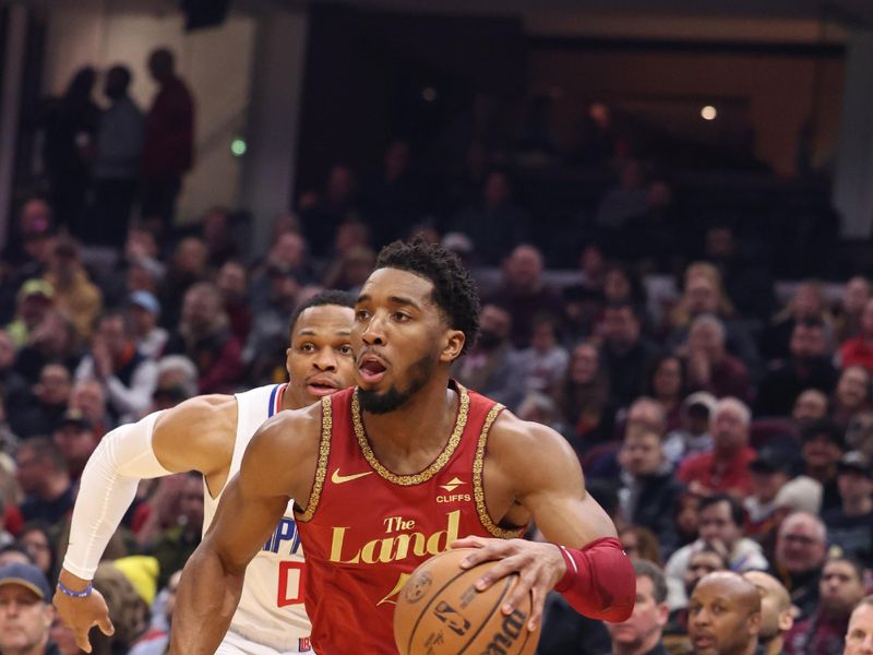 CLEVELAND, OH - JANUARY 29:  Donovan Mitchell #45 of the Cleveland Cavaliers goes to the basket during the game on January 29, 2024 at Rocket Mortgage FieldHouse in Cleveland, Ohio. NOTE TO USER: User expressly acknowledges and agrees that, by downloading and/or using this Photograph, user is consenting to the terms and conditions of the Getty Images License Agreement. Mandatory Copyright Notice: Copyright 2024 NBAE (Photo by  Lauren Leigh Bacho/NBAE via Getty Images)