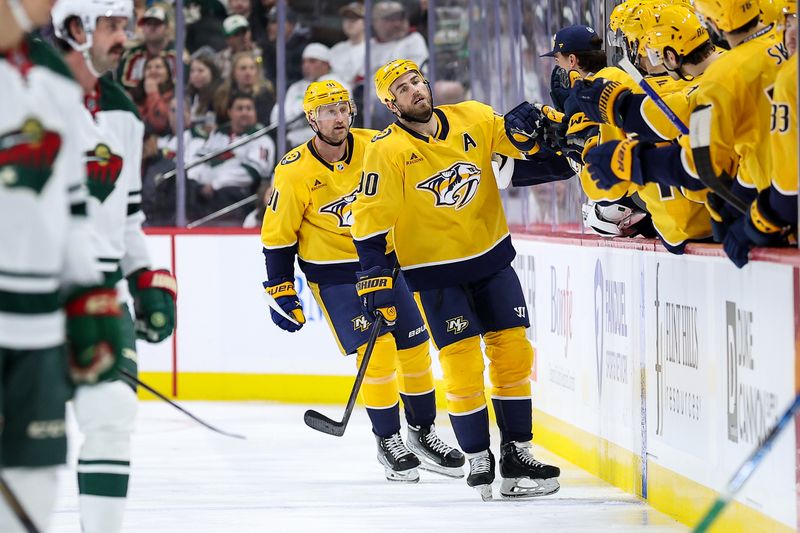 Nov 30, 2024; Saint Paul, Minnesota, USA; Nashville Predators center Ryan O'Reilly (90) celebrates his goal against the Minnesota Wild during the second period at Xcel Energy Center. Mandatory Credit: Matt Krohn-Imagn Images