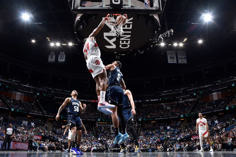 ORLANDO, FL - MARCH 17: Jahmi'us Ramsey #37 of the Toronto Raptors dunks the ball during the game against the Orlando Magic on March 17, 2024 at the Kia Center in Orlando, Florida. NOTE TO USER: User expressly acknowledges and agrees that, by downloading and or using this photograph, User is consenting to the terms and conditions of the Getty Images License Agreement. Mandatory Copyright Notice: Copyright 2024 NBAE (Photo by Fernando Medina/NBAE via Getty Images)