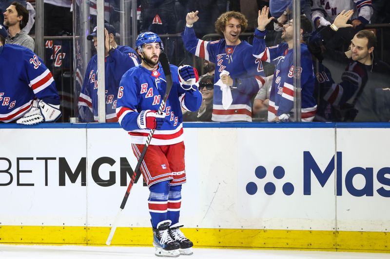 May 5, 2024; New York, New York, USA; New York Rangers center Vincent Trocheck (16) skates back to center ice after scoring a goal in the first period against the Carolina Hurricanes in game one of the second round of the 2024 Stanley Cup Playoffs at Madison Square Garden. Mandatory Credit: Wendell Cruz-USA TODAY Sports