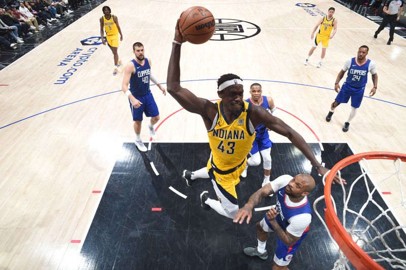 LOS ANGELES, CA - MARCH 25: Pascal Siakam #43 of the Indiana Pacers dunks the ball during the game against the LA Clippers on March 25, 2024 at Crypto.Com Arena in Los Angeles, California. NOTE TO USER: User expressly acknowledges and agrees that, by downloading and/or using this Photograph, user is consenting to the terms and conditions of the Getty Images License Agreement. Mandatory Copyright Notice: Copyright 2024 NBAE (Photo by Adam Pantozzi/NBAE via Getty Images)