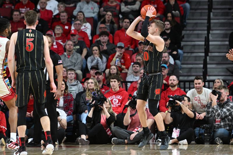 Feb 11, 2023; Lincoln, Nebraska, USA;  Wisconsin Badgers guard Isaac Lindsey (10) shoots the ball against the Nebraska Cornhuskers in the first half at Pinnacle Bank Arena. Mandatory Credit: Steven Branscombe-USA TODAY Sports