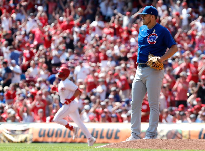 Sep 3, 2023; Cincinnati, Ohio, USA; Chicago Cubs starting pitcher Jameson Taillon (right) waits at the mound as Cincinnati Reds second baseman Spencer Steer (left) runs the bases after hitting a solo home run in the first inning at Great American Ball Park. Mandatory Credit: David Kohl-USA TODAY Sports