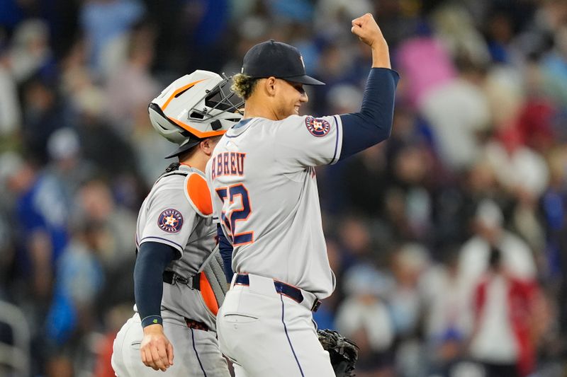 Sep 10, 2025; Toronto, Ontario, CAN; Houston Astros pitcher Bryan Abreu (52) reacts after a win against the Toronto Blue Jays at Rogers Centre. Mandatory Credit: John E. Sokolowski-Imagn Images