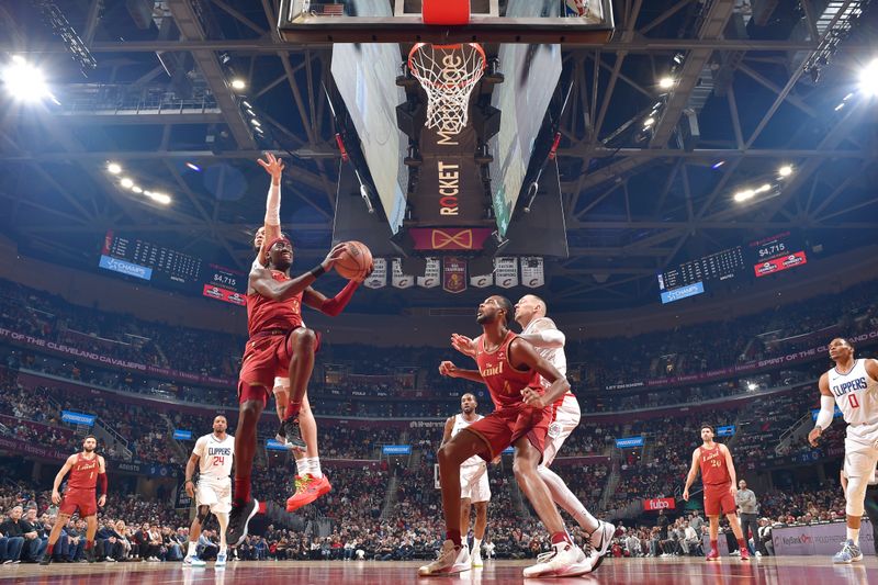 CLEVELAND, OH - JANUARY 29: Caris LeVert #3 of the Cleveland Cavaliers drives to the basket during the game against the LA Clippers on January 29, 2024 at Rocket Mortgage FieldHouse in Cleveland, Ohio. NOTE TO USER: User expressly acknowledges and agrees that, by downloading and/or using this Photograph, user is consenting to the terms and conditions of the Getty Images License Agreement. Mandatory Copyright Notice: Copyright 2024 NBAE (Photo by David Liam Kyle/NBAE via Getty Images)