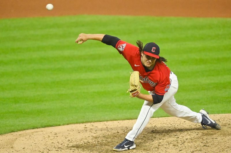 Aug 9, 2023; Cleveland, Ohio, USA; Cleveland Guardians relief pitcher Eli Morgan (49) delivers a pitch in the seventh inning against the Toronto Blue Jays at Progressive Field. Mandatory Credit: David Richard-USA TODAY Sports